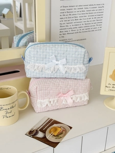 Pastel checkered quilted makeup bags with lace bow accents and heart stitching