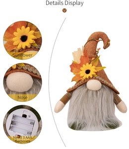 Detailansicht der Thanksgiving-Zwergfigur mit Sonnenblumen und AAA-Batteriefach