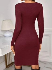 Slim fit burgundy maternity dress with ribbed knit texture and long sleeves shown from back