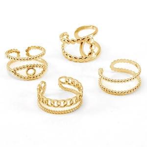 Close-up of four 18K gold-plated adjustable rings featuring bead and chain textures