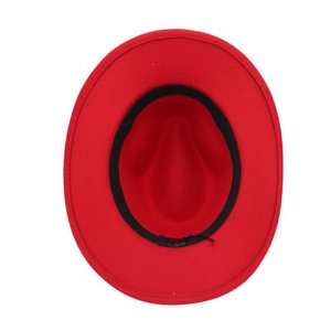 Top view of red felt cowboy hat featuring black sweatband and wide flat brim details