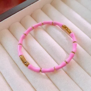 Bracciale rigido in smalto rosa stile bambù in acciaio inossidabile con finiture oro