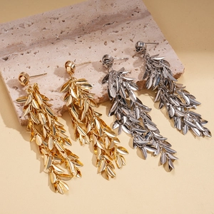 Geometric leaf tassel earrings in gold and silver finish with long metallic fringe