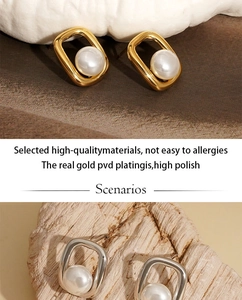 Detailed view of square hoop earrings with pearl centers in gold and silver finish