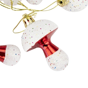 Glittery white and red mushroom Christmas tree hanging ornaments with golden strings