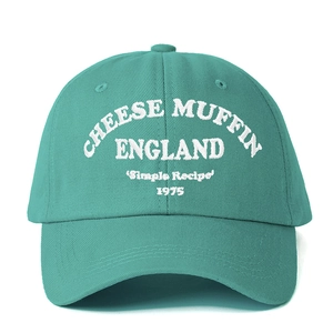 Teal cotton baseball cap with white CHEESE MUFFIN 3D embroidery and adjustable strap
