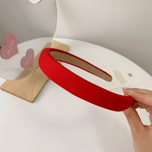 Red padded sponge headband with fine knit texture and anti-slip lining for women