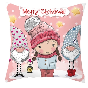 Detail of pink Christmas gnome pillow cover with Merry Christmas illustration and girl