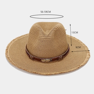Ethnic straw sun hat with frayed brim and metal feather charm ornament for women