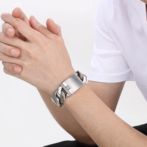 Polished 24mm wide stainless steel Cuban link bracelet for men and women on wrist