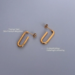Orecchini a forma di U in acciaio al titanio dorato dal design geometrico minimalista