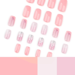 Pink French gradient press-on nails set with silver star patterns and square-oval tips