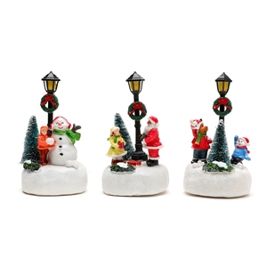 Lighted Christmas resin miniatures set with Santa, snowman, street lamp and snowy base