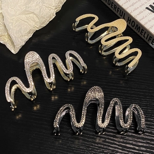 Elegant wavy rhinestone hair claw clips in gold silver and gun black colors