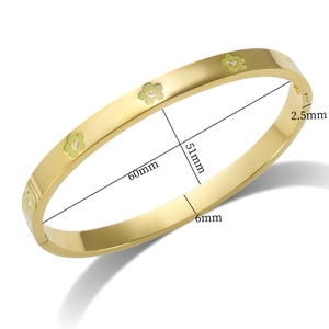 Detailed view of gold open bangle showing 51mm inner diameter and 6mm surface width