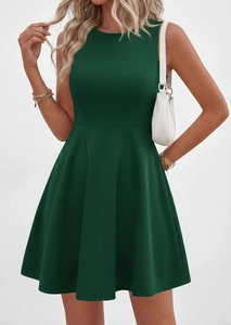Detail view of dark green sleeveless A-line summer dress with minimalist accessories