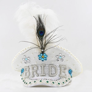 Detail of white sequin bride military hat with pearls, feathers and blue rhinestone flowers