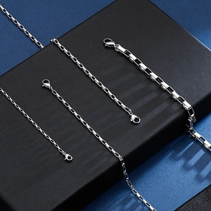 Detail view of four different widths of silver stainless steel box chains with lobster clasps