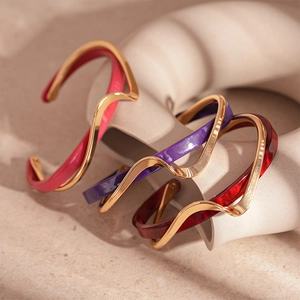 Gold plated double layer open bangle with geometric resin in pink and purple colors