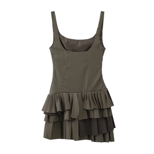 Olive green sleeveless pleated mini dress with layered ruffle hem on white background