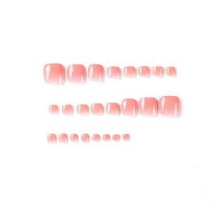 Pink gradient glossy press-on toe nails set in various sizes on white background