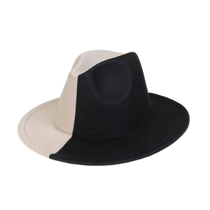 Detail shot of bicolor black and white felt fedora hat with a wide brim and wool texture