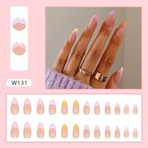 French tip press-on nails in pastel colors featuring a long almond shape, 24-piece kit