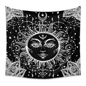Detailed black and white bohemian sun and moon tapestry with celestial mandala patterns