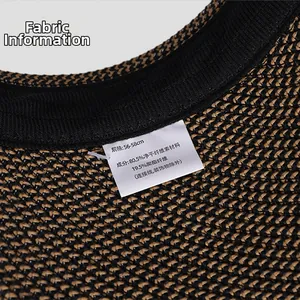 Detail of grey straw sun hat showing the woven texture and fabric care label inside