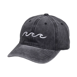 Macro view of wave embroidery on a black washed distressed cotton baseball cap