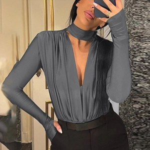 Detail of dark grey V-neck bodysuit with choker neck and ruched wrap front design