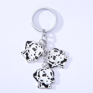 Adorable dalmatian dog charms keychain with three alloy pendants on a silver metal ring