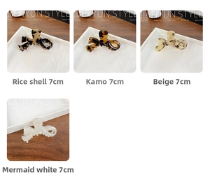 Detail view of 7cm acetate bow hair claws in beige tortoise, coffee and mermaid white