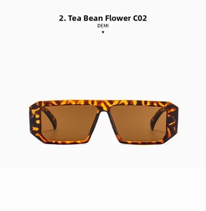 Detail of retro tortoiseshell rectangular sunglasses with thick frames and brown lenses