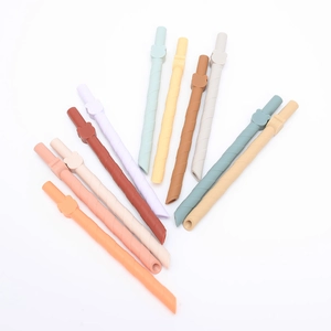 Colorful spiral silicone straws featuring cute animal toppers on a clean white background