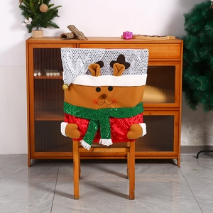 Detailed view of Christmas reindeer chair cover with red sequins and 3D plush antlers