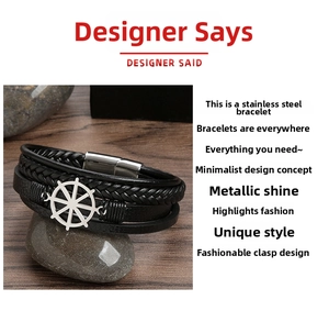 Macro detail of men's leather braided bracelet with polished steel nautical helm charm