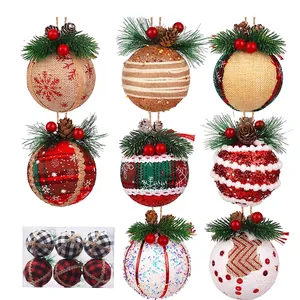 Plaid Christmas tree balls set with pine needles, red berries and hanging strings