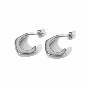 Polished silver geometric C-shape stainless steel earrings with butterfly back on white