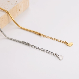 Elegant stainless steel snake chain bracelets in gold and silver with heart pendant