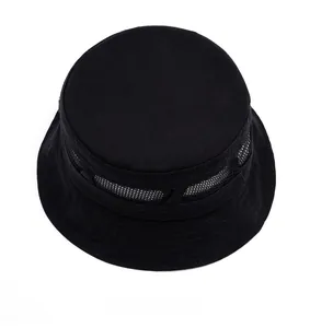 Detailed top view of black sun hat featuring breathable mesh ventilation and flat top design