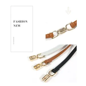 Three elegant slim waist belts in white brown and black with golden D-ring buckles