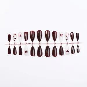 Deep wine red and white almond press-on nails with sweet heart patterns for Valentine's