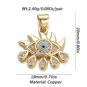 Detail view of gold-plated copper evil eye charm with blue zircon stones and dimensions