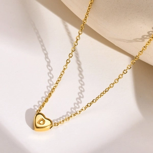 Minimalist gold heart necklace with letter D engraving and cable chain for women