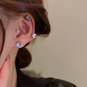 Silver magnetic zircon stud earrings set for women featuring four sizes of round crystals