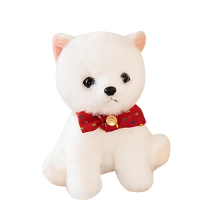 Adorable white Pomeranian plush toy dog with a red polka dot bow tie in sitting position