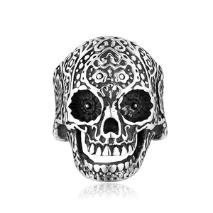 Men's retro gothic skull ring featuring intricate floral carvings and a vintage silver finish