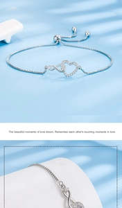 Detail of silver heart and infinity bracelet with sparkling cubic zirconia and pull clasp