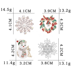 Cartoon Christmas brooches set featuring snowflake, wreath and snowman designs
